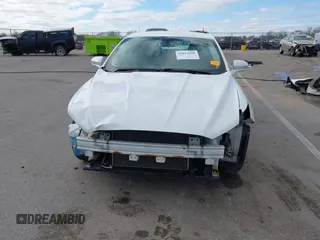 2016 Ford Fusion SE with VIN 1FA6P0H75G5127062, listed as a IAAI auction lot 42012696 with 169,489 mi miles and . Bid and sale history available at carsss.com. Image 13.