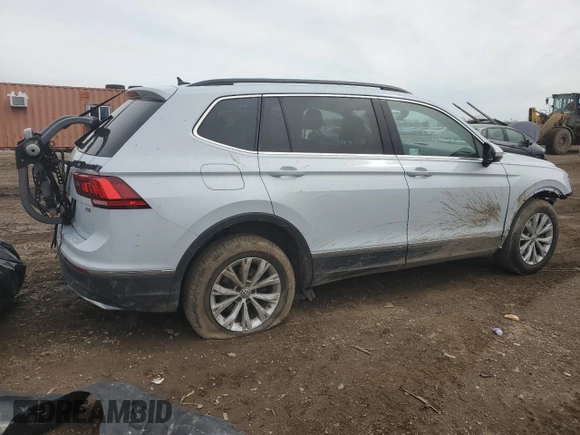 2018 Volkswagen Tiguan SEL z VIN 3VV3B7AX2JM001338, wystawiony jako Copart lot #51742105 z przebiegiem 71 555 mil mil oraz Szkoda całkowita • Salvage title. Historia ofert i sprzedaży dostępna na DreamBid. Obrazek 3.