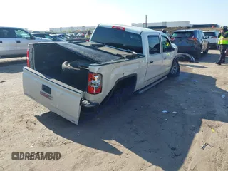 2014 GMC Sierra 1500 SLT with VIN 3GTP1VEC5EG486951, listed as a IAAI auction lot 41939376 with 131,857 mi miles and . Bid and sale history available at DreamBid. Image 4.