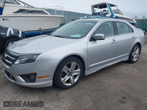 2011 Ford Fusion SPORT with VIN 3FAHP0DC1BR342102, listed as a IAAI auction lot 41704227 with 180,802 mi miles. Bid and sale history available at carsss.com. Image 2.