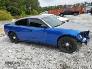 2022 Dodge Charger Police with VIN 2C3CDXAT5NH116675, listed as a Copart auction lot 55891205 with 59,669 mi miles and Salvage Title. Bid and sale history available at DreamBid. Image 4.