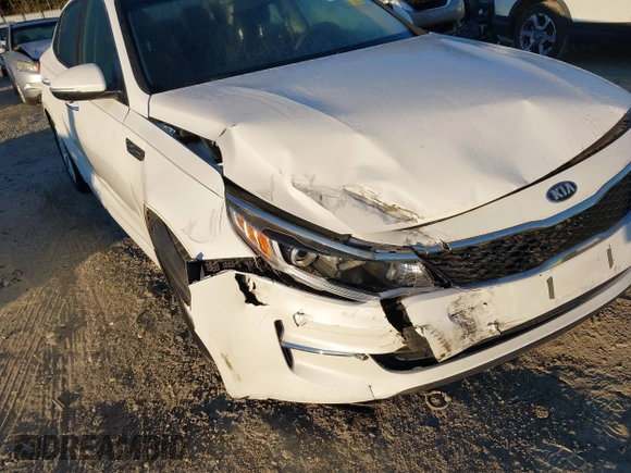 2018 Kia Optima LX with VIN 5XXGT4L32JG265716, listed as a IAAI auction lot 40645411 with 112,305 mi miles and . Bid and sale history available at DreamBid. Image 6.
