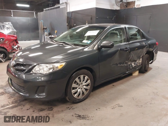 2013 Toyota Corolla L with VIN 2T1BU4EEXDC025315, listed as a IAAI auction lot 40978281 with 106,597 mi miles and . Bid and sale history available at carsss.com. Image 2.