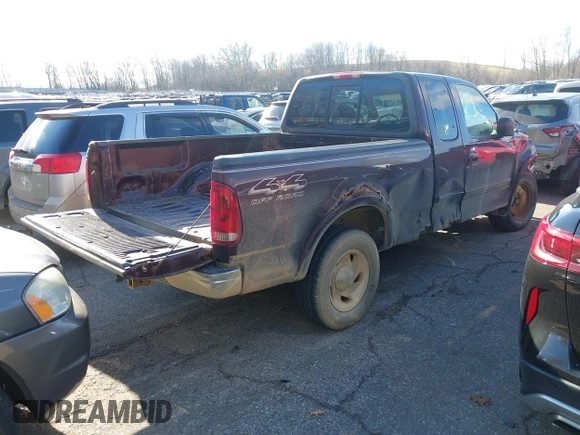 2000 Ford F-150 XL with VIN 1FTRX18W7YNA15739, listed as a IAAI auction lot 40954299 with 218,018 mi miles and . Bid and sale history available at DreamBid. Image 4.
