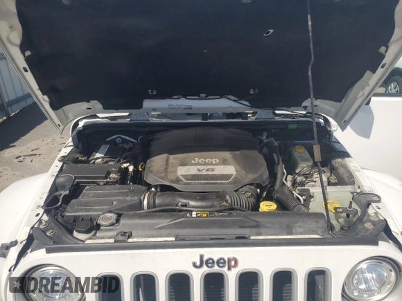 2017 Jeep Wrangler Unlimited 75th Anniversary z VIN 1C4BJWEG6HL636575, wystawiony jako Copart lot #54149875 z przebiegiem 129 721 mil mil oraz Szkoda całkowita • Salvage title. Historia ofert i sprzedaży dostępna na DreamBid. Obrazek 11.