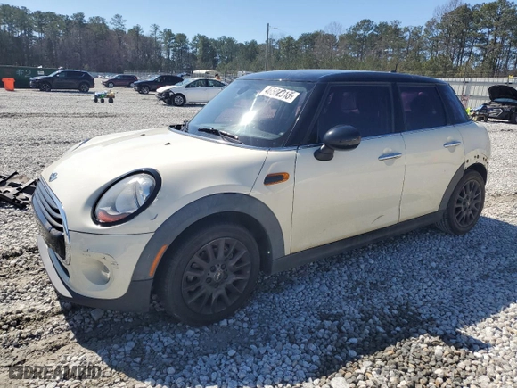 2017 MINI Hardtop 4 Door Cooper with VIN WMWXU1C59H2E17486, listed as a Copart auction lot 46502315 with 107,639 mi miles and Salvage Title. Bid and sale history available at carsss.com. Image 1.