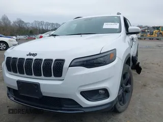 2021 Jeep Cherokee Altitude with VIN 1C4PJMLB1MD122073, listed as a IAAI auction lot 41526259 with 54,503 mi miles. Bid and sale history available at carsss.com. Image 12.