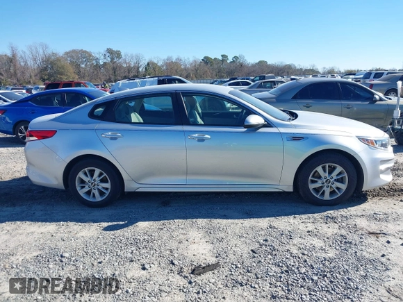 2016 Kia Optima LX with VIN 5XXGT4L37GG015462, listed as a IAAI auction lot 41247091 with 165,755 mi miles and . Bid and sale history available at DreamBid. Image 13.