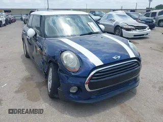 2017 MINI Hardtop 4 Door Cooper z VIN WMWXU1C59H2E18069, wystawiony jako IAAI lot #42286035 z przebiegiem 85 835 mil mil oraz . Historia ofert i sprzedaży dostępna na DreamBid. Obrazek 1.