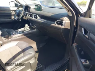 2017 Mazda CX-5 Touring z VIN JM3KFBCL0H0209458, wystawiony jako IAAI lot #42169599 z przebiegiem 93 287 mil mil oraz . Historia ofert i sprzedaży dostępna na DreamBid. Obrazek 5.