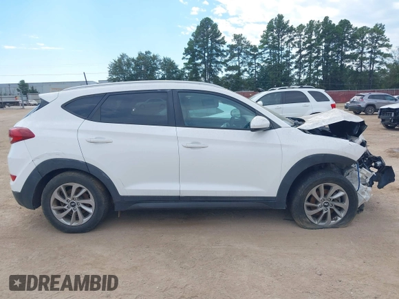 2016 Hyundai Tucson SE z VIN KM8J3CA43GU092864, wystawiony jako IAAI lot #40366787 z przebiegiem 126 462 mil mil oraz . Historia ofert i sprzedaży dostępna na DreamBid. Obrazek 13.