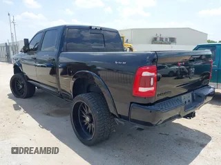 2021 Ram 2500 Laramie with VIN 3C6UR5FL7MG621346, listed as a IAAI auction lot 42419962 with 96,647 mi miles and . Bid and sale history available at DreamBid. Image 3.