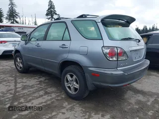 2002 Lexus RX 300 with VIN JTJHF10U020285132, listed as a IAAI auction lot 42153983 with 257,776 mi miles. Bid and sale history available at carsss.com. Image 3.