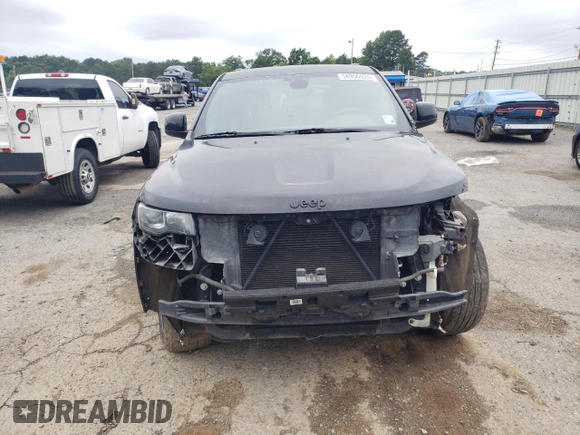 2018 Jeep Grand Cherokee Laredo E with VIN 1C4RJFAG4JC138319, listed as a Copart auction lot 54956925 with 144,938 mi miles and Salvage title. Bid and sale history available at DreamBid. Image 5.