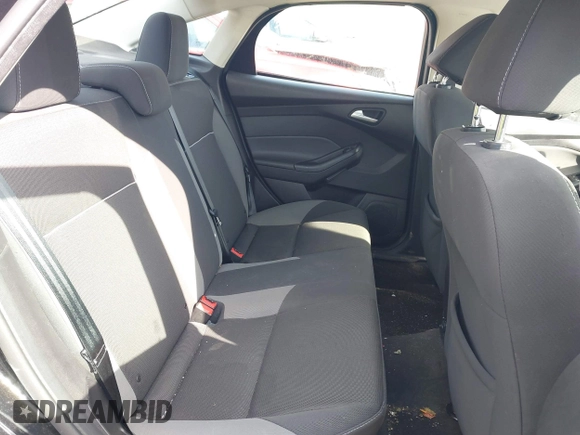 2013 Ford Focus SE z VIN 1FADP3F28DL312357, wystawiony jako IAAI lot #41798311 z przebiegiem 98 280 mil mil oraz . Historia ofert i sprzedaży dostępna na DreamBid. Obrazek 8.