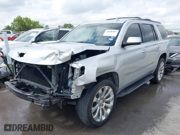 2019 Chevrolet Tahoe LT with VIN 1GNSCBKC7KR326466, listed as a IAAI auction lot 42048492 with 65,913 mi miles and . Bid and sale history available at DreamBid. Image 2.
