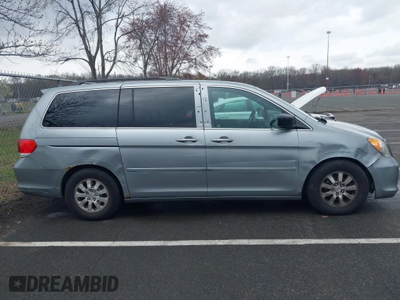 2008 Honda Odyssey EX-L with VIN 5FNRL38718B115950, listed as a IAAI auction lot 41957715 with 226,033 mi miles and . Bid and sale history available at DreamBid. Image 13.