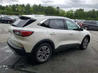 2021 Ford Escape SEL z VIN 1FMCU9H64MUA51011, wystawiony jako Copart lot #58241615 z przebiegiem 100 075 mil mil oraz Czysty tytuł • Clean title. Historia ofert i sprzedaży dostępna na DreamBid. Obrazek 3.