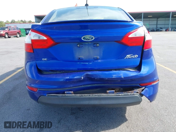2014 Ford Fiesta SE with VIN 3FADP4BJ5EM190009, listed as a IAAI auction lot 42036976 with 157,575 mi miles. Bid and sale history available at carsss.com. Image 13.