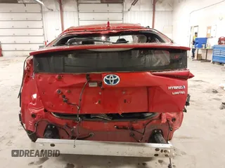 2021 Toyota Prius L Eco z VIN JTDKAMFU1M3143311, wystawiony jako IAAI lot #41961005 z przebiegiem 42 275 mil mil oraz . Historia ofert i sprzedaży dostępna na DreamBid. Obrazek 6.