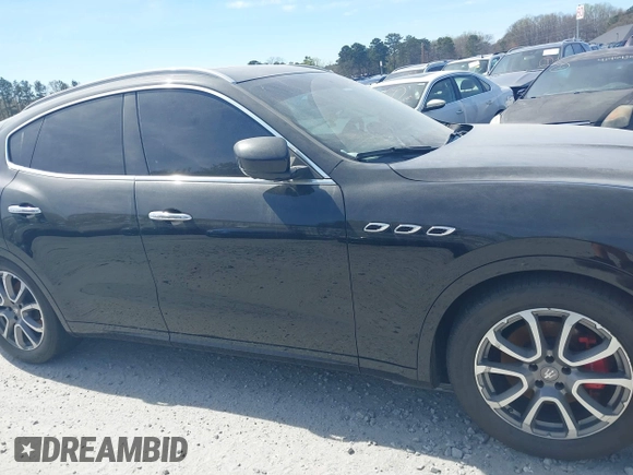 2017 Maserati Levante z VIN ZN661XUL1HX257769, wystawiony jako IAAI lot #41703740 z przebiegiem 107 038 mil mil oraz . Historia ofert i sprzedaży dostępna na DreamBid. Obrazek 13.