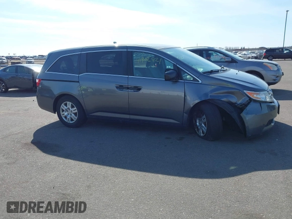 2012 Honda Odyssey LX with VIN 5FNRL5H24CB145694, listed as a IAAI auction lot 41902821 with 134,402 mi miles and . Bid and sale history available at carsss.com. Image 13.