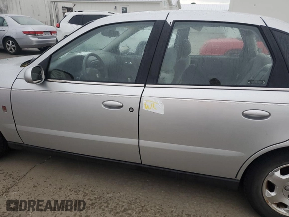 2002 Saturn LS z VIN 1G8JW54R32Y517171, wystawiony jako Copart lot #74849884 z przebiegiem Nie podano mil oraz Szkody całkowita. Historia ofert i sprzedaży dostępna na DreamBid. Obrazek 12.
