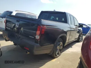 2023 Honda Ridgeline RTL-E with VIN 5FPYK3F72PB001592, listed as a Copart auction lot 52154625 with 41,153 mi miles and Salvage title. Bid and sale history available at DreamBid. Image 3.