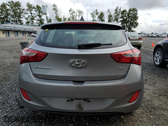 2013 Hyundai Elantra z VIN KMHD35LE3DU075234, wystawiony jako Copart lot #57754185 z przebiegiem 107 040 mil mil oraz Szkoda całkowita • Salvage title. Historia ofert i sprzedaży dostępna na DreamBid. Obrazek 6.