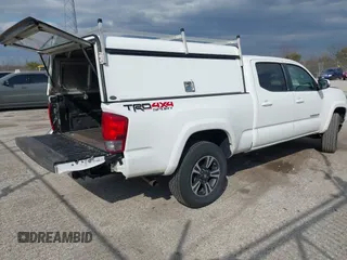 2017 Toyota Tacoma SR5 with VIN 3TMDZ5BN4HM018877, listed as a IAAI auction lot 41898666 with 198,848 mi miles. Bid and sale history available at carsss.com. Image 4.