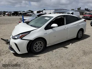 2020 Toyota Prius L Eco with VIN JTDKARFU3L3122858, listed as a Copart auction lot 51014035 with 99,110 mi miles and Salvage Title. Bid and sale history available at carsss.com. Image 1.