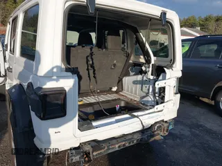 2020 Jeep Wrangler Unlimited Sahara with VIN 1C4HJXENXLW220910, listed as a IAAI auction lot 41090420 with 88,895 mi miles and . Bid and sale history available at DreamBid. Image 6.