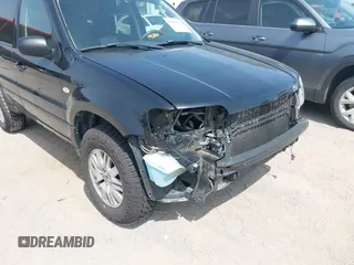 2006 Mercury Mariner Convenience with VIN 4M2YU56Z66KJ04591, listed as a IAAI auction lot 42469116 with 174,952 mi miles and . Bid and sale history available at DreamBid. Image 6.