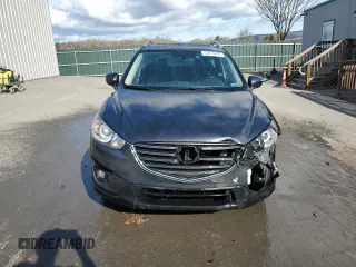2016 Mazda CX-5 Grand Touring with VIN JM3KE4DY0G0679190, listed as a Copart auction lot 53619495 with 154,649 mi miles and Salvage Title. Bid and sale history available at carsss.com. Image 5.