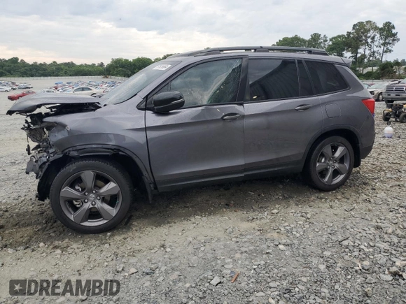 2021 Honda Passport Touring z VIN 5FNYF7H94MB005741, wystawiony jako Copart lot #57626664 z przebiegiem Nie podano mil oraz Szkoda całkowita • Salvage title. Historia ofert i sprzedaży dostępna na DreamBid. Obrazek 1.