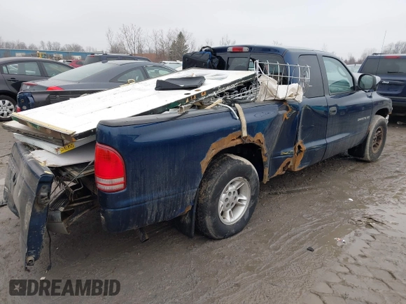 2000 Dodge Dakota with VIN 1B7GL22X8YS553040, listed as a IAAI auction lot 41186125 with 88,127 mi miles. Bid and sale history available at carsss.com. Image 4.