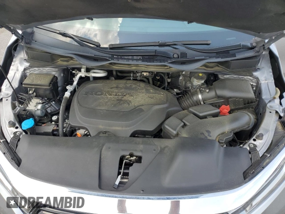 2021 Honda Odyssey Touring z VIN 5FNRL6H85MB039444, wystawiony jako Copart lot #57142205 z przebiegiem 74 228 mil mil oraz Szkoda całkowita • Salvage title. Historia ofert i sprzedaży dostępna na DreamBid. Obrazek 12.