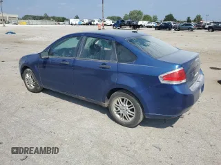 2009 Ford Focus SE with VIN 1FAHP35N69W173977, listed as a Copart auction lot 69018554 with 138,496 mi miles and Salvage Title. Bid and sale history available at carsss.com. Image 2.