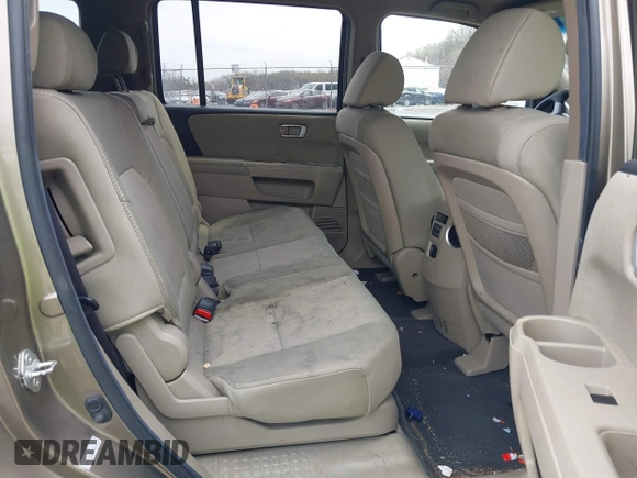 2011 Honda Pilot LX z VIN 5FNYF4H21BB103169, wystawiony jako IAAI lot #41957506 z przebiegiem 124 150 mil mil oraz . Historia ofert i sprzedaży dostępna na DreamBid. Obrazek 8.