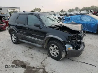 2005 Ford Escape XLT with VIN 1FMYU931X5KD14729, listed as a Copart auction lot 71127464 with 0 mi miles and Salvage Title. Bid and sale history available at carsss.com. Image 4.
