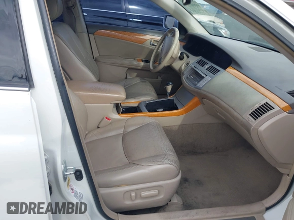 2007 Toyota Avalon XL with VIN 4T1BK36B97U252227, listed as a IAAI auction lot 42067958 with 245,781 mi miles. Bid and sale history available at carsss.com. Image 5.