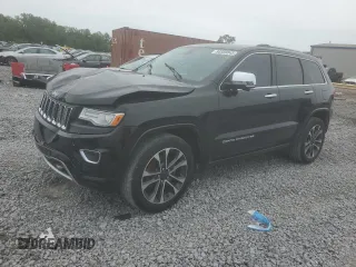 2015 Jeep Grand Cherokee Overland с VIN 1C4RJECG9FC620315, выставлен на аукционе Copart как лот 54569845 с пробегом 219 905 миль миль и Списание • Salvage title. История ставок и продаж доступна на DreamBid. Изображение 1.