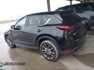 2021 Mazda CX-5 Signature with VIN JM3KFBEY5M0432033, listed as a IAAI auction lot 41607215 with 49,870 mi miles. Bid and sale history available at carsss.com. Image 14.