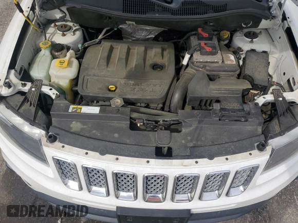 2016 Jeep Compass Latitude with VIN 1C4NJDEBXGD767720, listed as a Copart auction lot 51644975 with 170,096 mi miles and Clean Title. Bid and sale history available at carsss.com. Image 12.