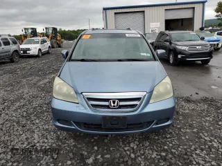 2006 Honda Odyssey EX-L z VIN 5FNRL38716B032192, wystawiony jako Copart lot #58402895 z przebiegiem 148 496 mil mil oraz Szkoda całkowita • Salvage title. Historia ofert i sprzedaży dostępna na DreamBid. Obrazek 5.