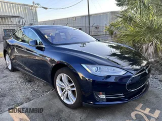 2013 Tesla Model S with VIN 5YJSA1DN8DFP17027, listed as a IAAI auction lot 42168317 with 148,394 mi miles. Bid and sale history available at carsss.com. Image 1.