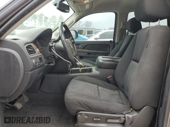 2011 Chevrolet Tahoe LS with VIN 1GNSCAE09BR138852, listed as a Copart auction lot 49165595 with 207,548 mi miles and Salvage title. Bid and sale history available at DreamBid. Image 7.
