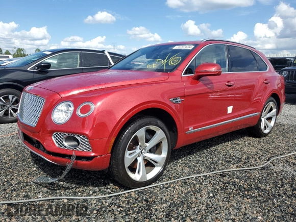 2017 Bentley Bentayga W12 z VIN SJAAC2ZV1HC014037, wystawiony jako Copart lot #73797634 z przebiegiem Nie podano mil oraz Szkoda całkowita • Salvage title. Historia ofert i sprzedaży dostępna na DreamBid. Obrazek 1.