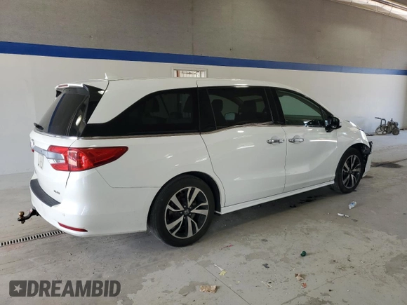 2018 Honda Odyssey Elite with VIN 5FNRL6H90JB103748, listed as a Copart auction lot 61512595 with 117,126 mi miles and Salvage title. Bid and sale history available at DreamBid. Image 3.