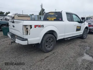 2015 Ford F-150 XLT with VIN 1FTEX1EP1FFA21653, listed as a IAAI auction lot 41597518 with 153,111 mi miles and . Bid and sale history available at DreamBid. Image 4.